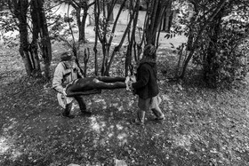 Création de l'homme de l'Ouort Marcel Joli Coeur : pose d'un enduit noir