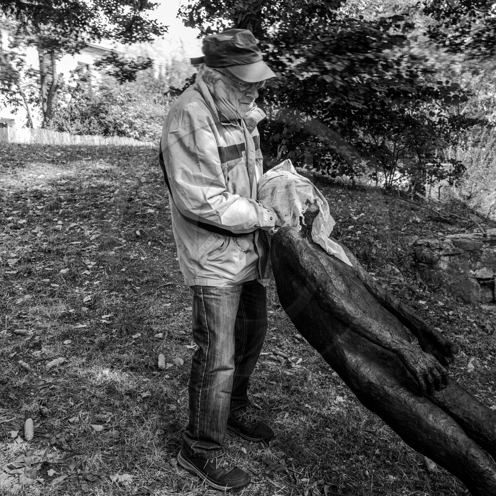 Création de l'homme de l'Ouort Marcel Joli Coeur : pose d'un enduit noir